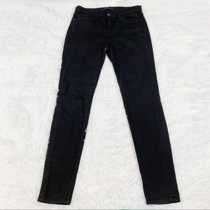 J Brand Black Skinny Leg Jeans in Shadow Des Mid rise distressed at knee